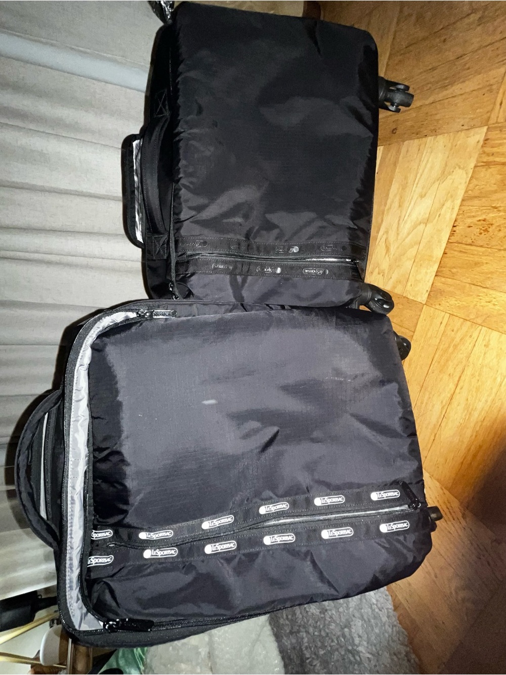 Lesportsac Black Rolling Travel Duffel with Zip Detailing